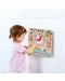 Ξύλινο παιδικό ημερολόγιο με ρολόι Tooky Toy - 5t